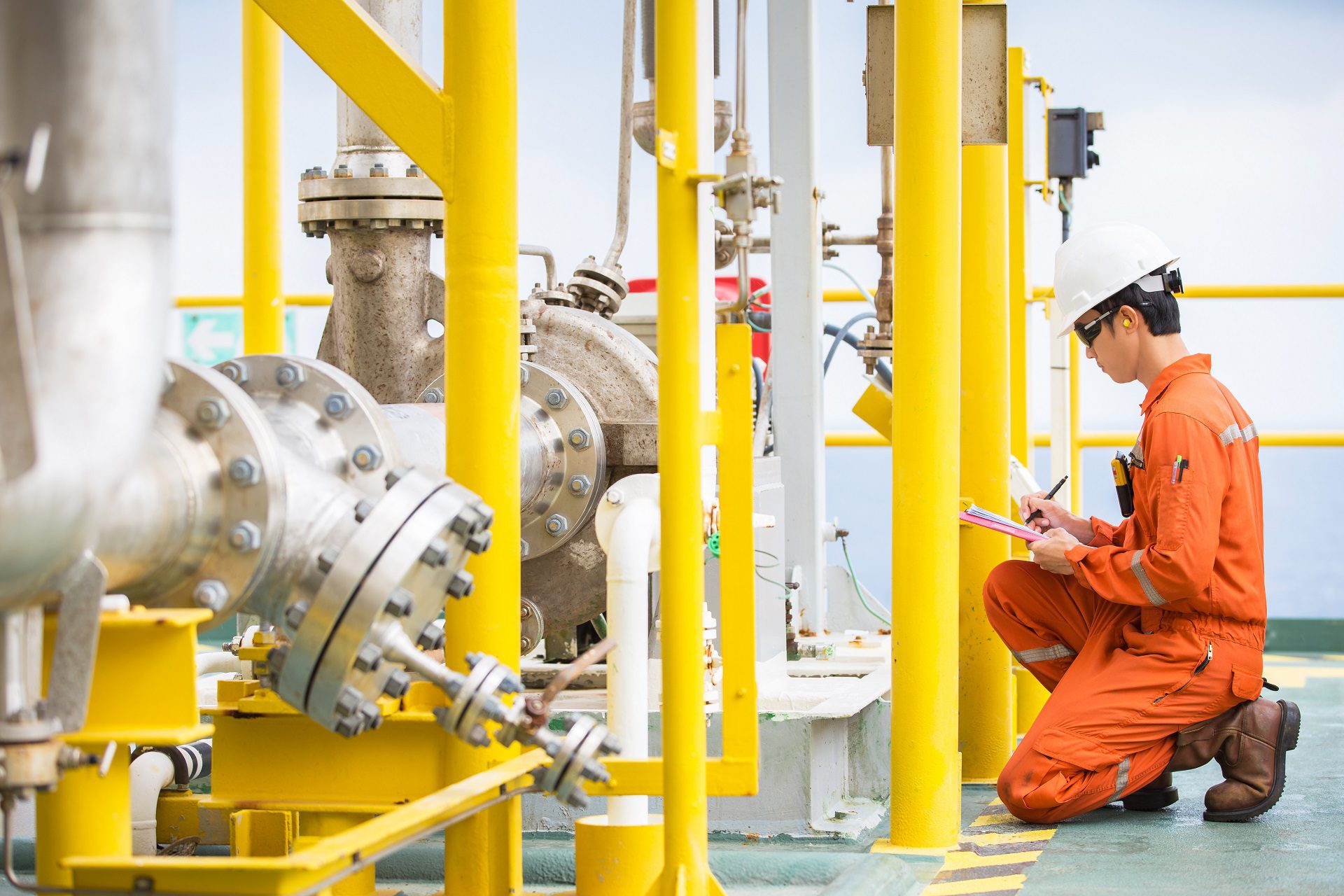 Occupational Health and Safety Specialist checking pipes